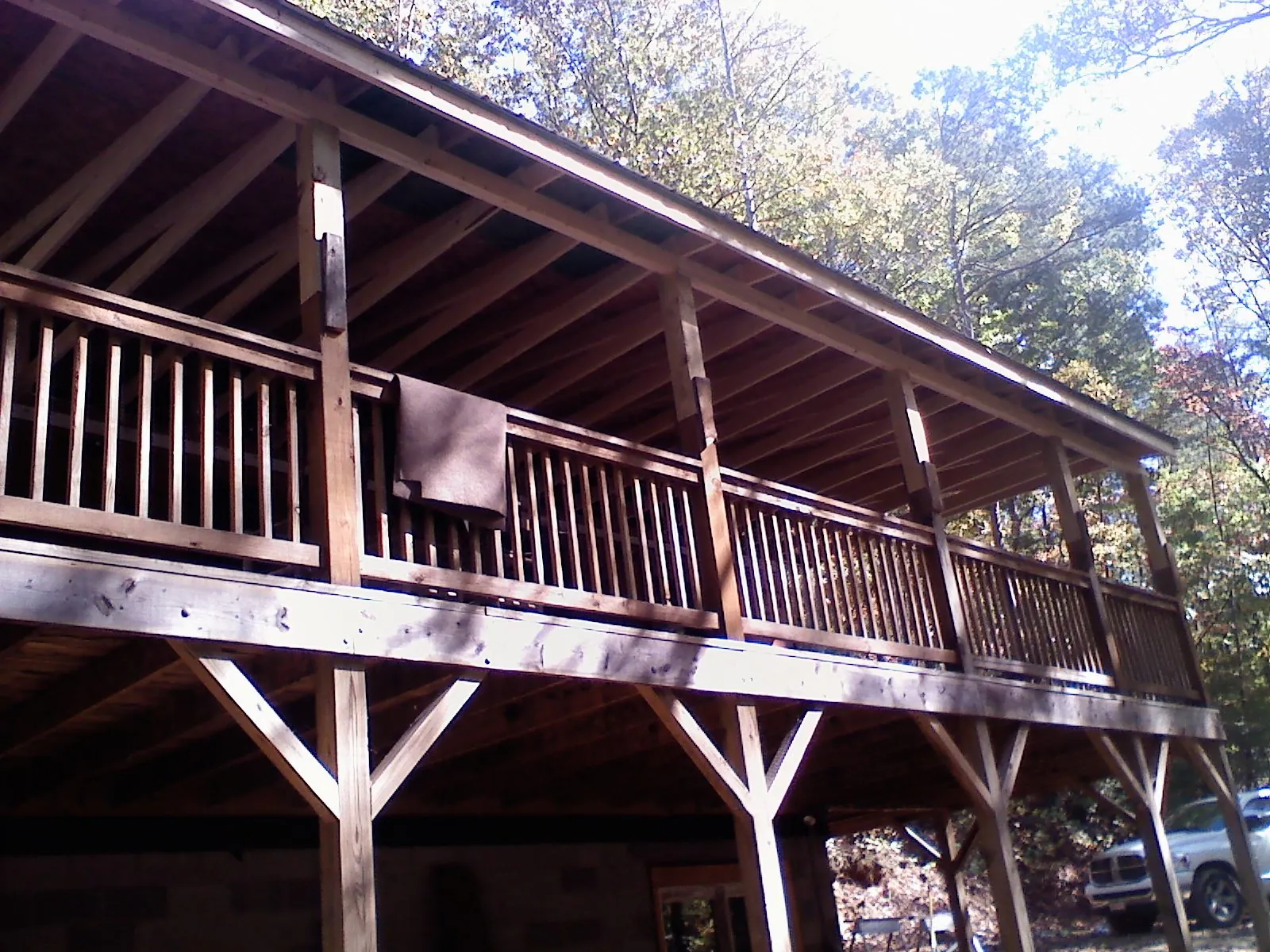 Timber framing under a new elevated porch and deck — Roof Leak Repair in Mamou by Roofing Brothers